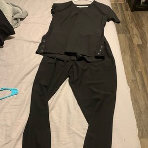 Black Med Couture scrubs.